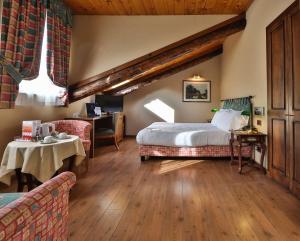 Postel nebo postele na pokoji v ubytování Best Western Hotel Piemontese