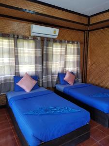 Postel nebo postele na pokoji v ubytování S Beach Resort