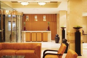 A seating area at Divani Palace Larissa