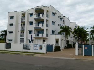 a large building with a large window on the side of the building at Madison Ocean Breeze Apartments in Townsville