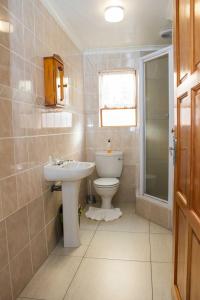 Bathroom sa De Helling Self Catering