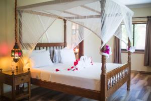 Postel nebo postele na pokoji v ubytování VRclub Paje Palms Beach Resort + 37 fotografií