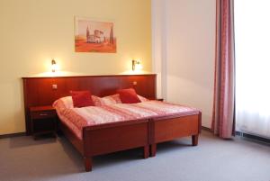 Posteľ alebo postele v izbe v ubytovaní Lázeňský Hotel Sadový Pramen
