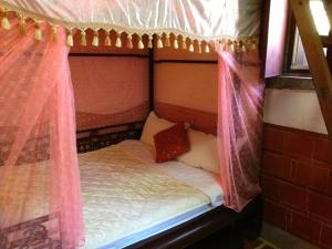 Katil atau katil-katil dalam bilik di Love nostalgia No. 53 B&B