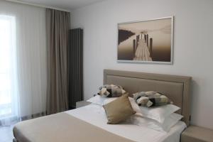 Posteľ alebo postele v izbe v ubytovaní On Beach-Mamaia Residence