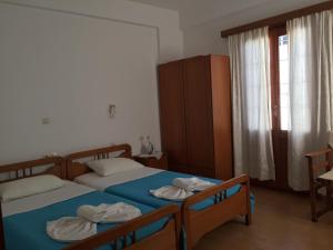 A bed or beds in a room at Livanina apartments