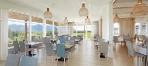 Um restaurante ou outro lugar para comer em Hotel Hamar