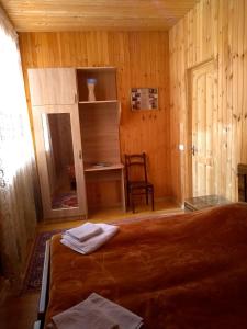 Postel nebo postele na pokoji v ubytování Guest House Guliada