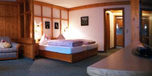 En eller flere senger på et rom på Hotel-Gasthof "Zur Mühle"