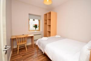 Voodi või voodid majutusasutuse Apartment 703 Letterfrack toas