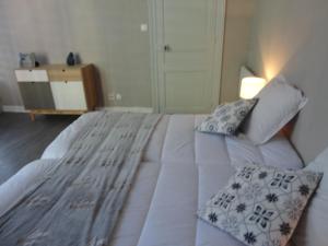 Łóżko lub łóżka w pokoju w obiekcie Mistral