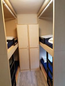 A bunk bed or bunk beds in a room at The Cove Hostel - Sea Ranch