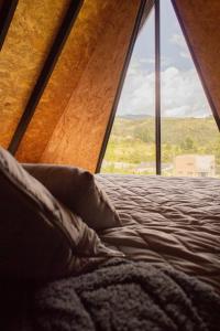 Postel nebo postele na pokoji v ubytování Cabanas Villa Helena + 37 fotografií