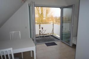 a view of a balcony with a sliding glass door at Appartement mit Aussicht in Mülheim an der Ruhr