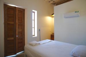 Voodi või voodid majutusasutuse Casa Tunido toas