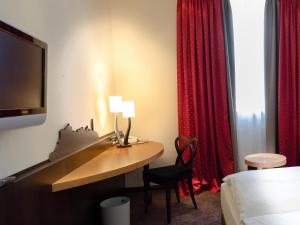 Postel nebo postele na pokoji v ubytování Hotel Post