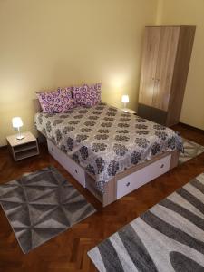 Giường trong phòng chung tại Casa Bella Chis