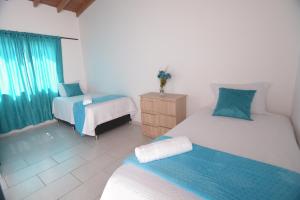 A bed or beds in a room at apartamentos casa Margarita en laureles estadio su hogar en Medellin