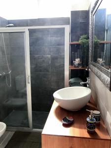 a bathroom with a white sink and a shower at Close to Everything | A/C+ WiFi | 1min Beach | in Los Cristianos