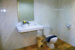 Koupelna v ubytování AddJitResort aonang - SHA Extra Plus