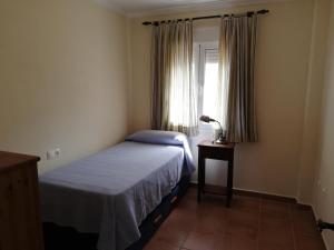 Posteľ alebo postele v izbe v ubytovaní CASA HACIENDA EL OLIVAR + 2 fotografie