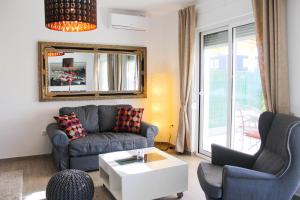 Posezení v ubytování Luxury apartment with private pool