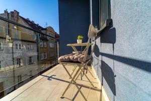 Balkón alebo terasa v ubytovaní Apartament przy Wyspie Młyńskiej