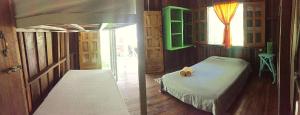 Katil atau katil-katil dalam bilik di Madre Selva Hostel
