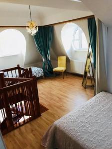 A bed or beds in a room at Apartament z widokiem na morze plaża promenada