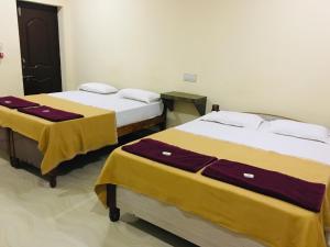 Hotel Varsha Hampi客房内的一张或多张床位