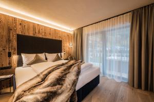 Llit o llits en una habitació de K1 Mountain Chalet - Luxury Apartements