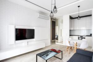 Telewizja i/lub zestaw kina domowego w obiekcie Exclusive Trendy Apartments