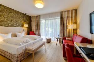 Postel nebo postele na pokoji v ubytování Hotel Pöker