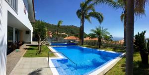Bazén v ubytování Abrigo da Madeira nebo v jeho okolí