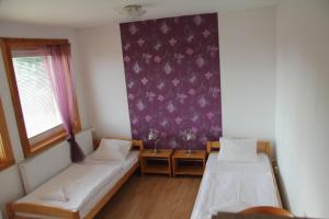 Postel nebo postele na pokoji v ubytování Holiday Park Vrchlabí - Liščí farma
