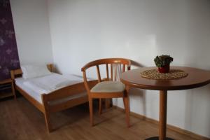 Postel nebo postele na pokoji v ubytování Holiday Park Vrchlabí - Liščí farma