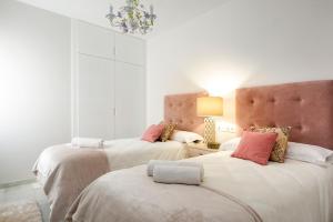 Posteľ alebo postele v izbe v ubytovaní Genteel Home Recogidas