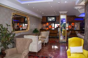 Lounge nebo bar v ubytování Hermanos Hotel
