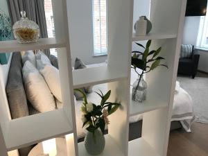 Postel nebo postele na pokoji v ubytování Antwerp Business Suites