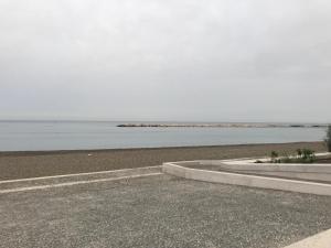 a view of the ocean from a parking lot at Bari Lory’s Home in Bari