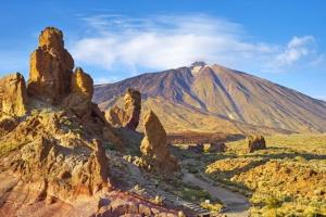 a mountain in the middle of a desert with a river at Apartamentos Ester in Santa Cruz de Tenerife