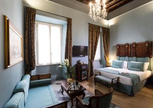 Posteľ alebo postele v izbe v ubytovaní Navona Grand Suite