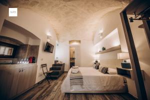 Кровать или кровати в номере Le Suite Bed