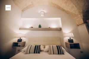 Кровать или кровати в номере Le Suite Bed