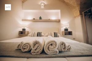 Кровать или кровати в номере Le Suite Bed