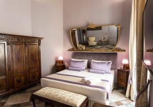 Posteľ alebo postele v izbe v ubytovaní Navona Grand Suite