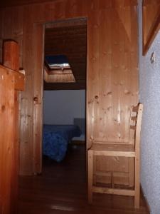 A bed or beds in a room at Mont Blanc Soleil E17