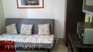 Łóżko lub łóżka w pokoju w obiekcie Holiday Apartments