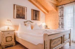 Ένα ή περισσότερα κρεβάτια σε δωμάτιο στο Apartment Stotzhalten DG - GRIWA RENT AG