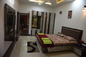 Letto o letti in una camera di Shree Ramkrishna Anandvan